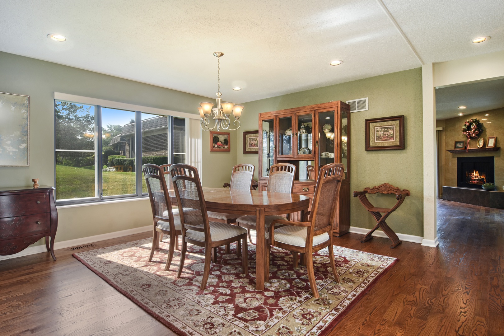 2305 Greenwood Road Northbrook, IL 60062 - Photo 8 of 25 a view of a dining room with furniture window and wooden floor