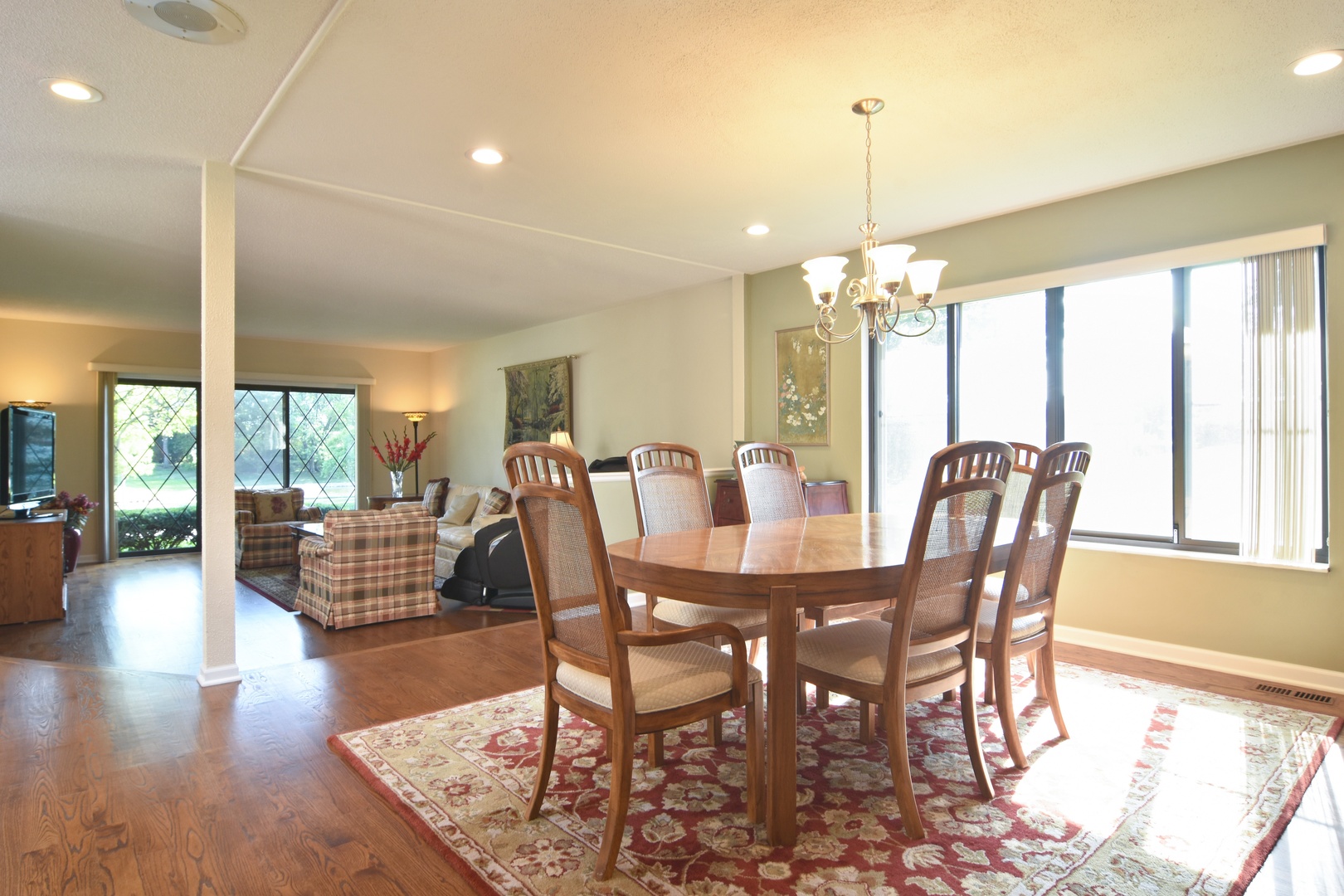 2305 Greenwood Road Northbrook, IL 60062 - Photo 9 of 25 a view of a dining room with furniture window and wooden floor