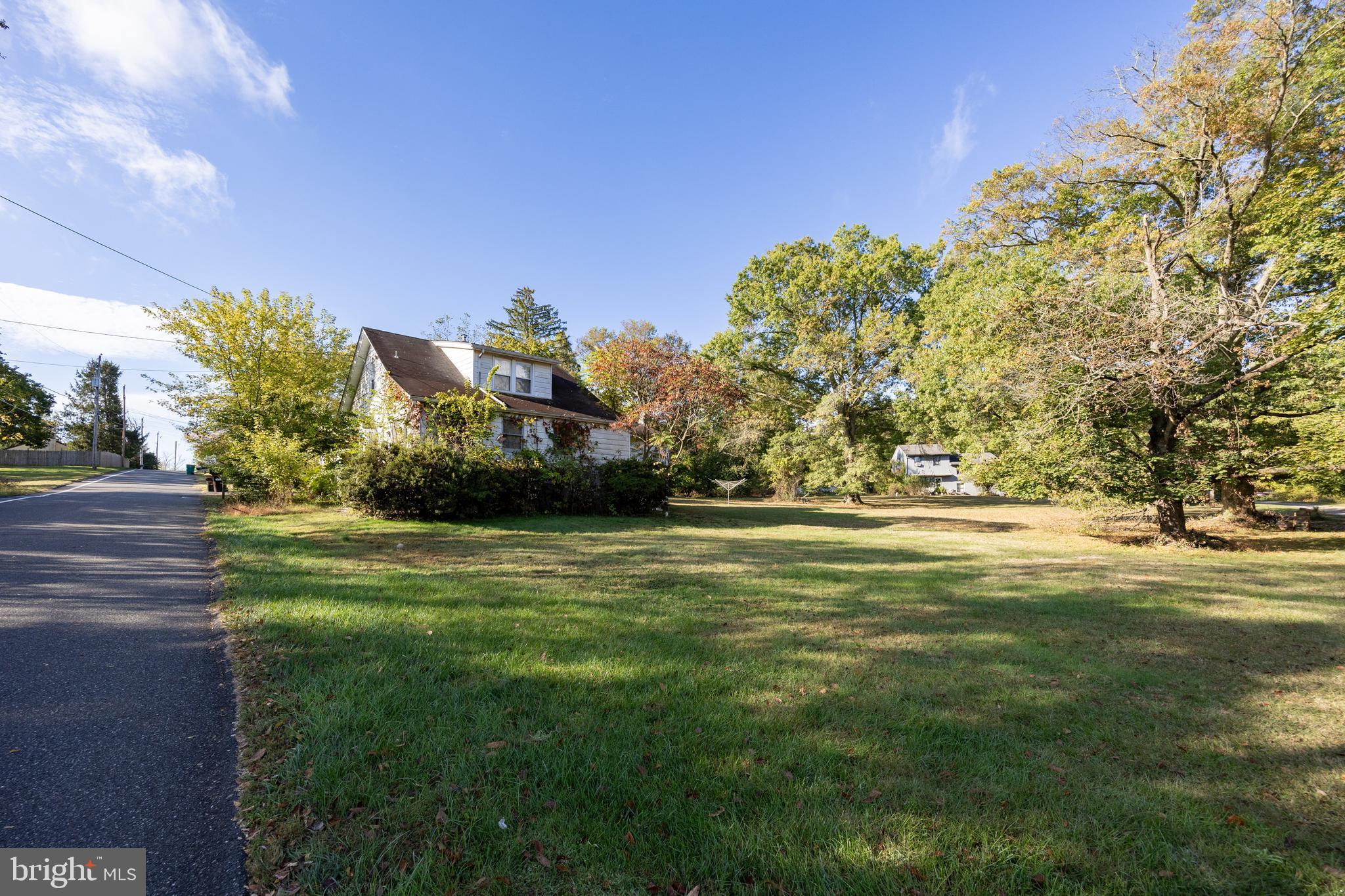 4 Boraten Road Royersford, PA 19468 - Photo 1 of 38 a view of yard with swimming pool and trees