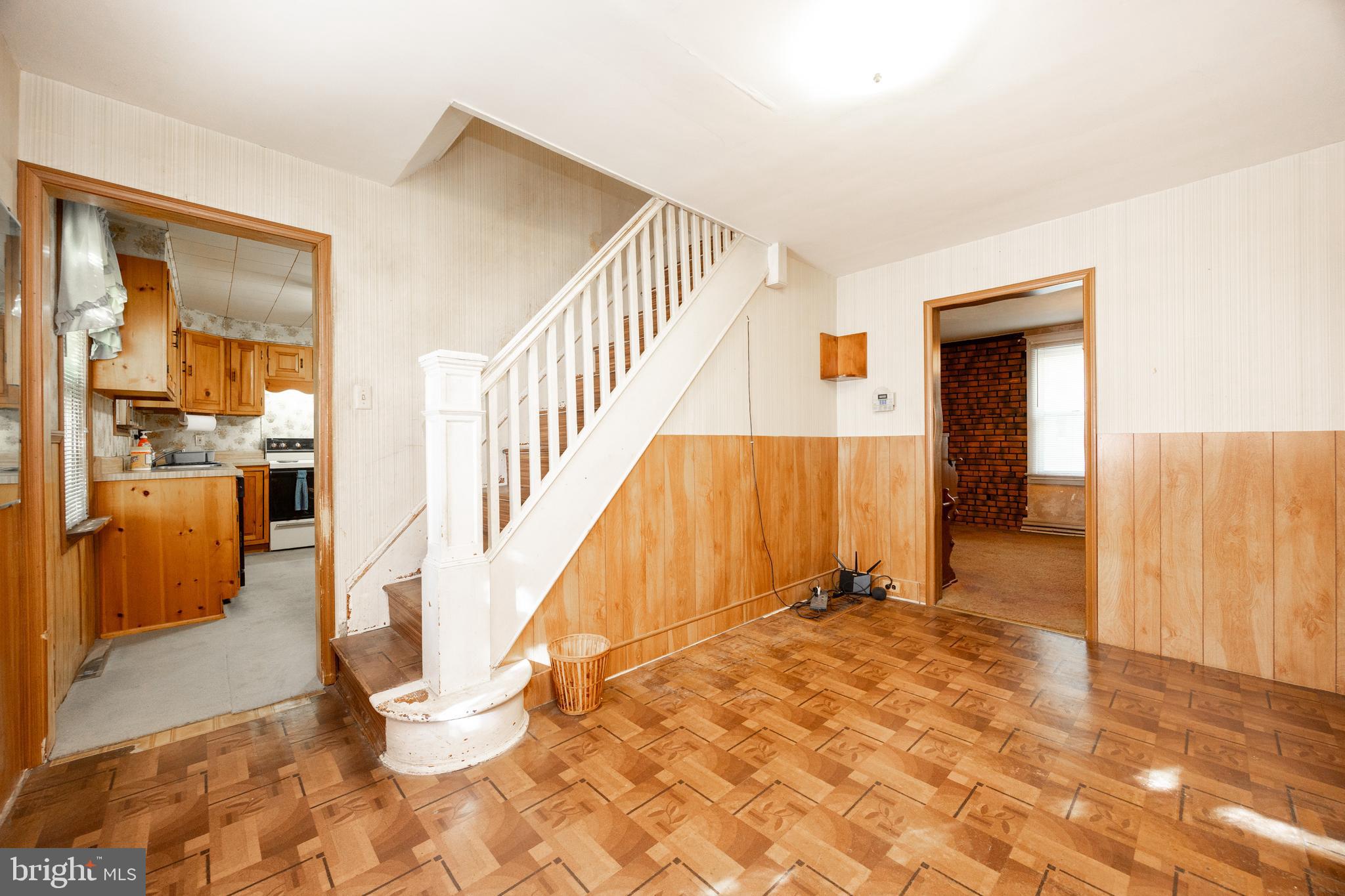 4 Boraten Road Royersford, PA 19468 - Photo 13 of 38 a view of a hallway with wooden floor and a living room