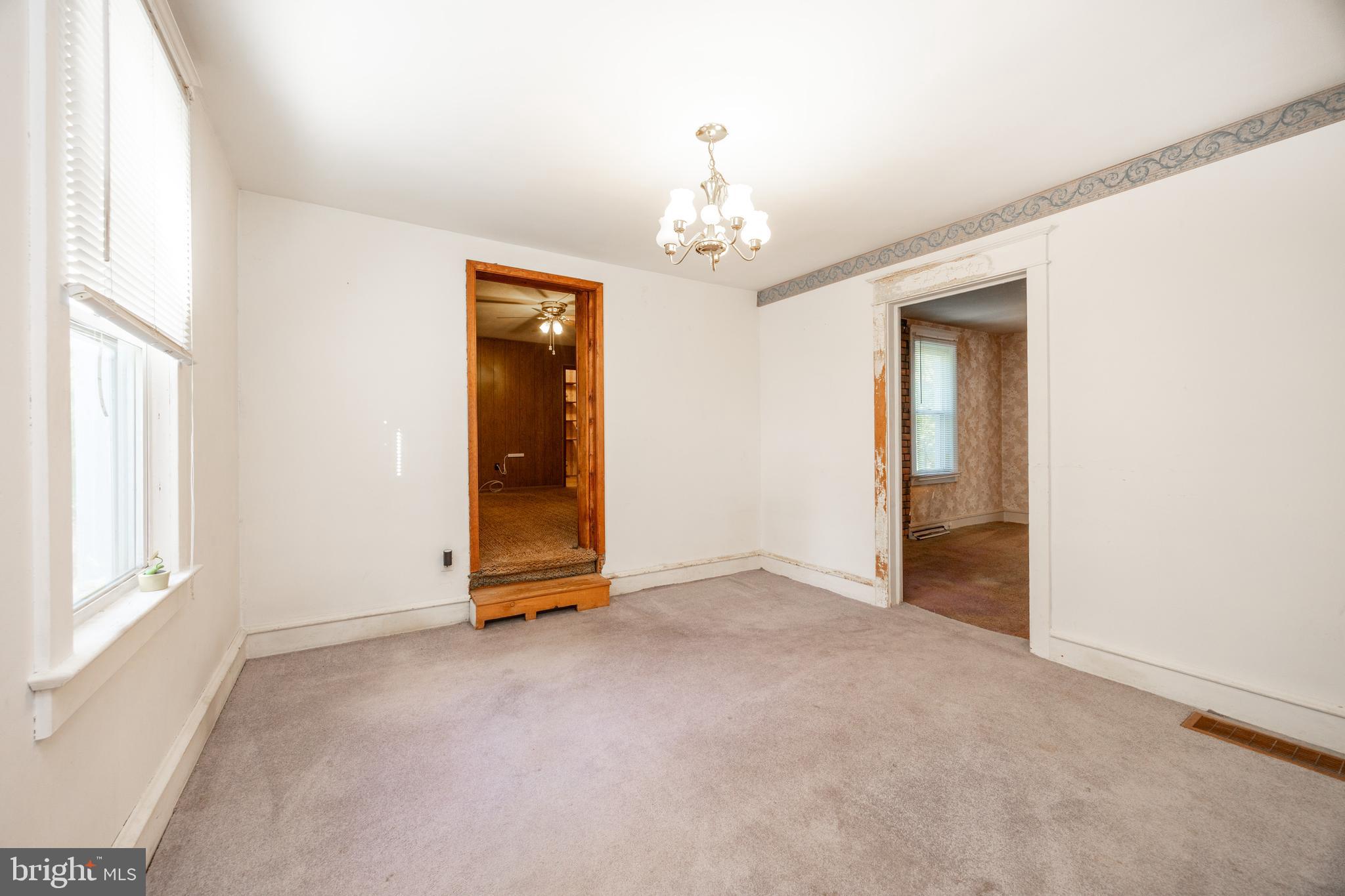 4 Boraten Road Royersford, PA 19468 - Photo 17 of 38 an empty room with chandelier fan and windows