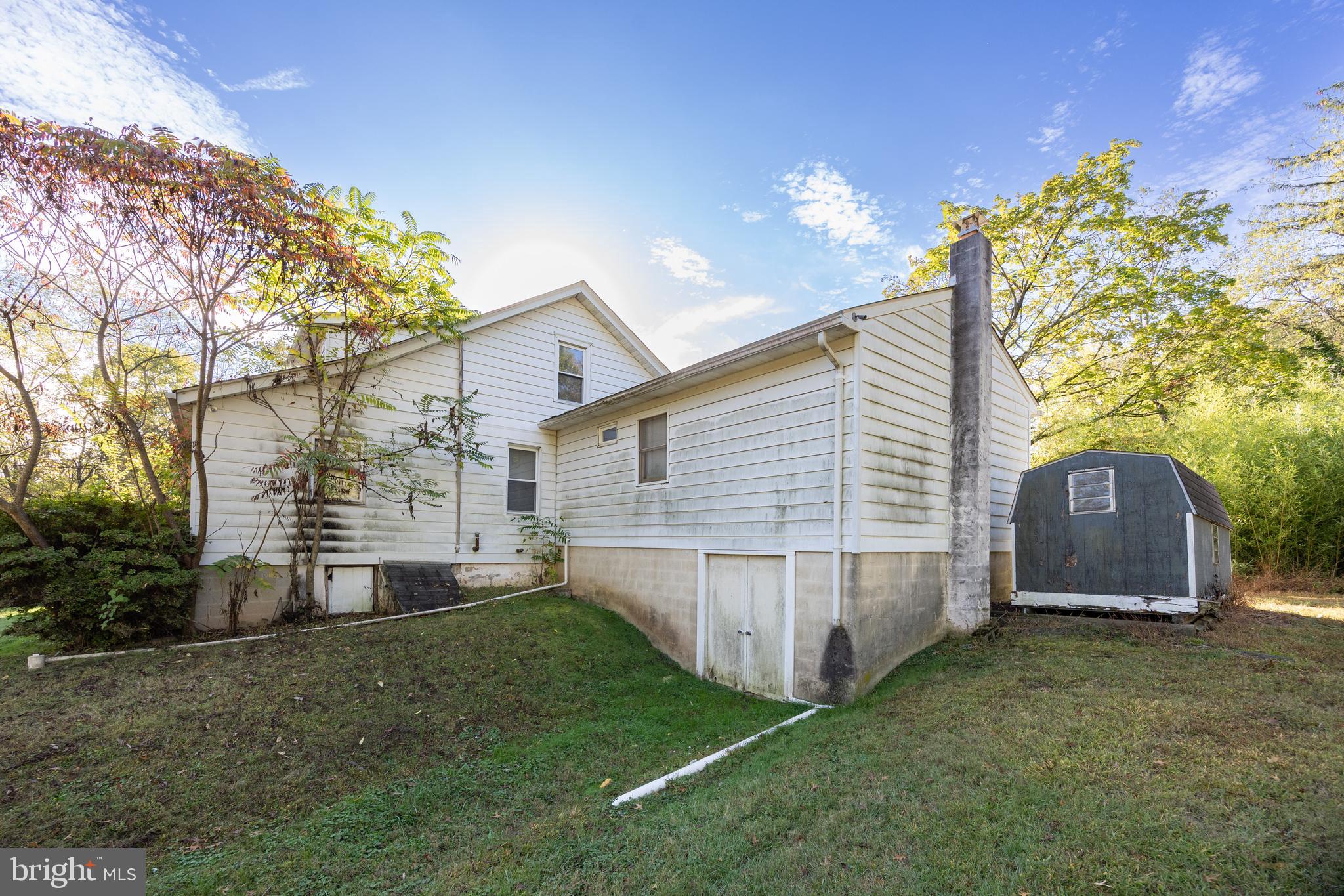 4 Boraten Road Royersford, PA 19468 - Photo 33 of 38 a view of a backyard with a garden