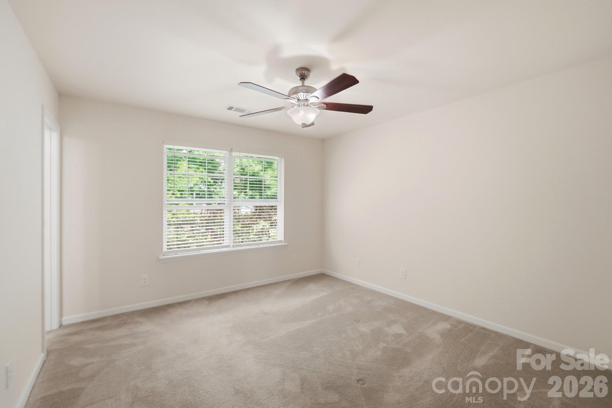 175 Limerick Road, Unit B Mooresville, NC 28115 - Photo 19 of 30 a view of an empty room with a window
