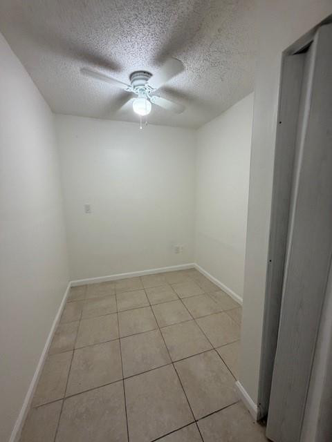 4654 Schall Road, Unit 4654 West Palm Beach, FL 33417 - Photo 5 of 11 a view of an empty room with a fan