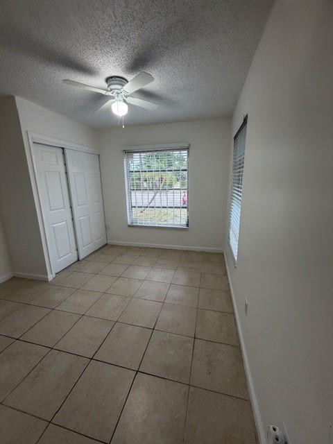 4654 Schall Road, Unit 4654 West Palm Beach, FL 33417 - Photo 7 of 11 a view of an empty room with a window