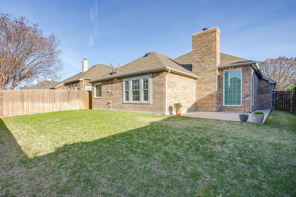 8105 Hosta Way Fort Worth, TX 76123 - Photo 31 of 33 a view of a house with a backyard
