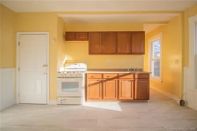 a view of a kitchen with a sink