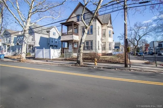 a view of a building with a street