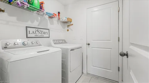 a view of a storage room with washer and dryer