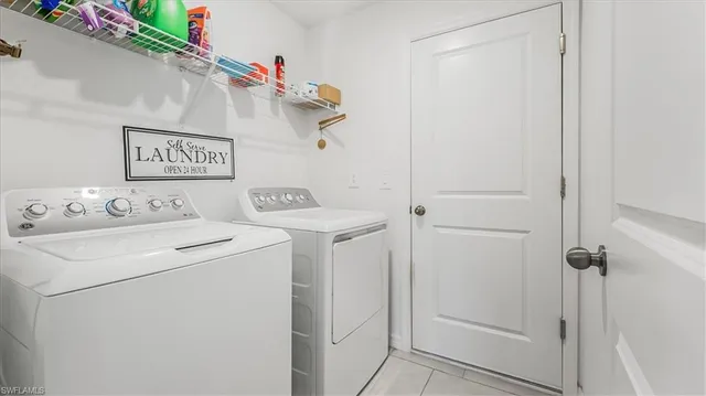 a view of a storage room with washer and dryer