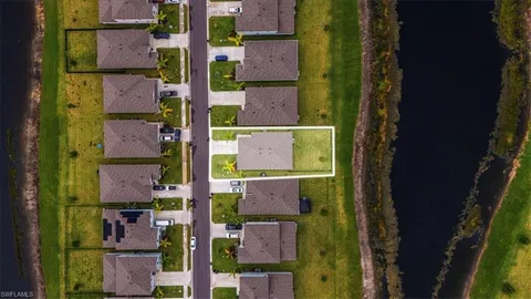 aerial view of a brick building with outdoor space