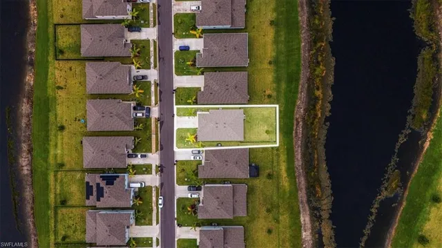 aerial view of a brick building with outdoor space