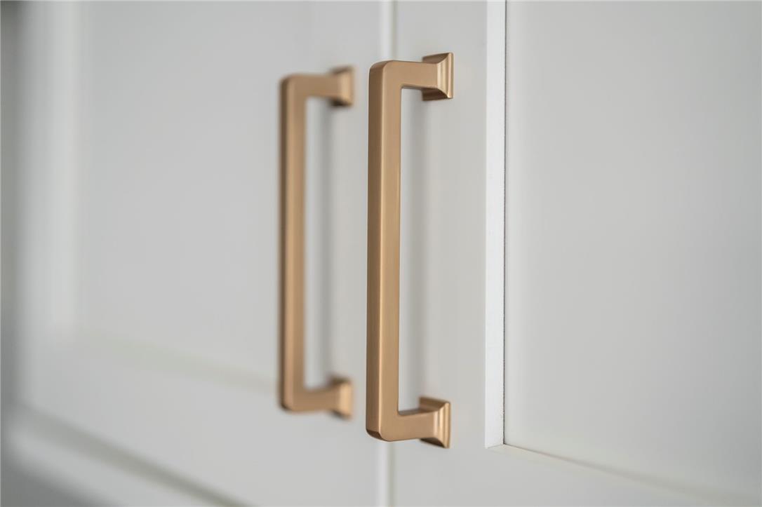 Hottle Road Quakertown, PA 18951 - Photo 41 of 59 Elegant gold pulls accent the clean lines of recessed-panel kitchen cabinetry.