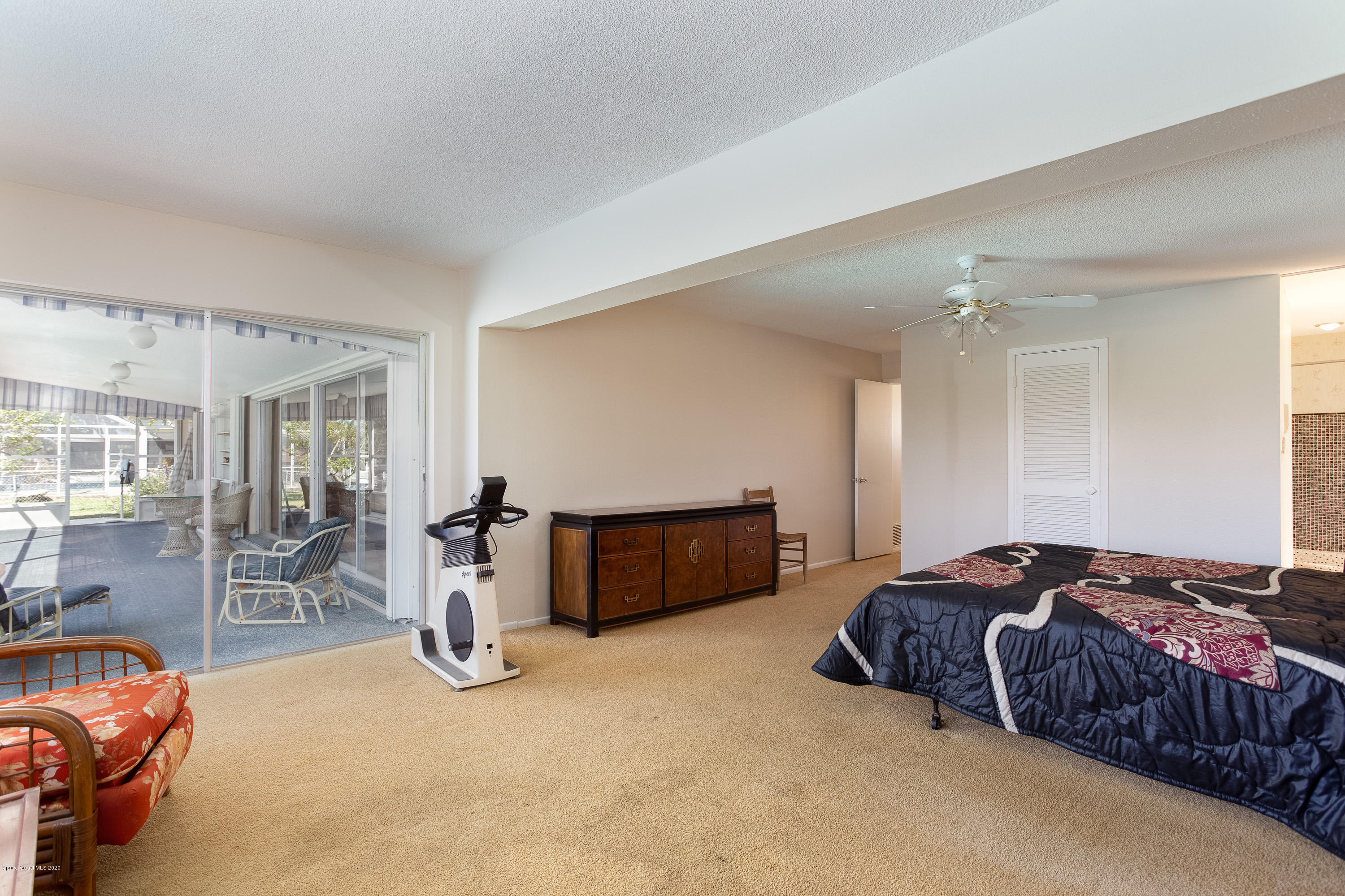 146 Bimini Road Cocoa Beach, FL 32931 - Photo 17 of 24 Master Slider to Screened Porch