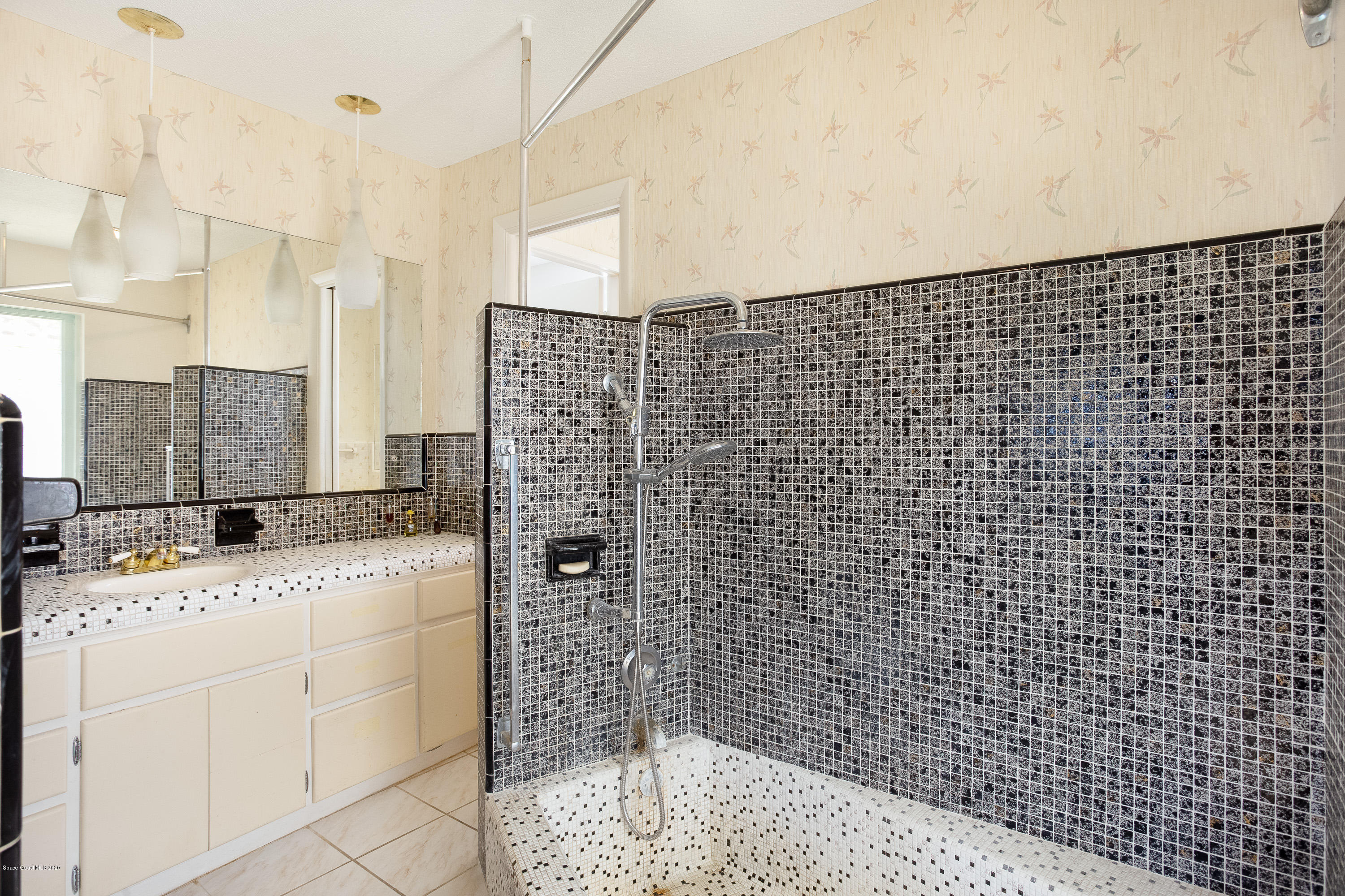 146 Bimini Road Cocoa Beach, FL 32931 - Photo 19 of 24 Vanity Sink Adjacent to Sunken Tub