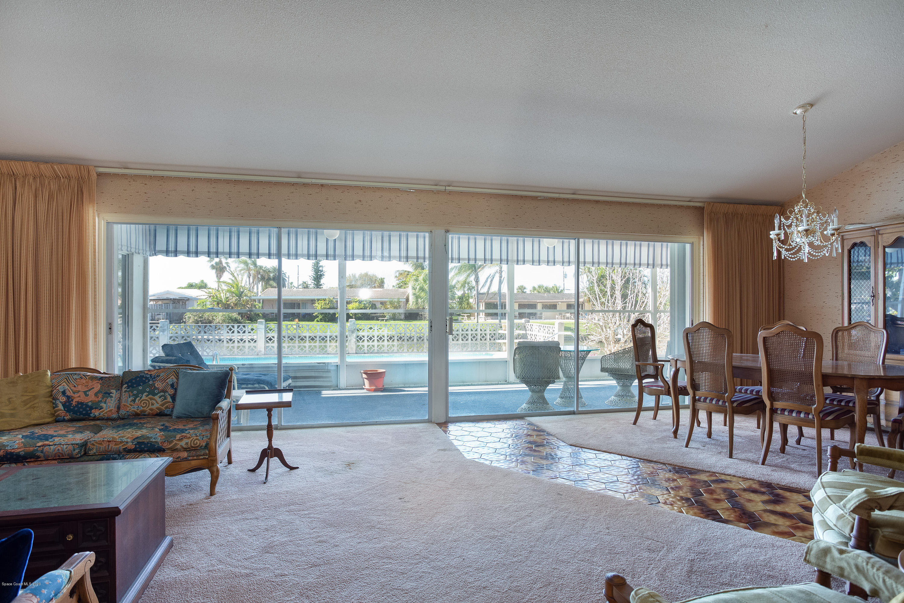 146 Bimini Road Cocoa Beach, FL 32931 - Photo 6 of 24 Living View of Pool & Water