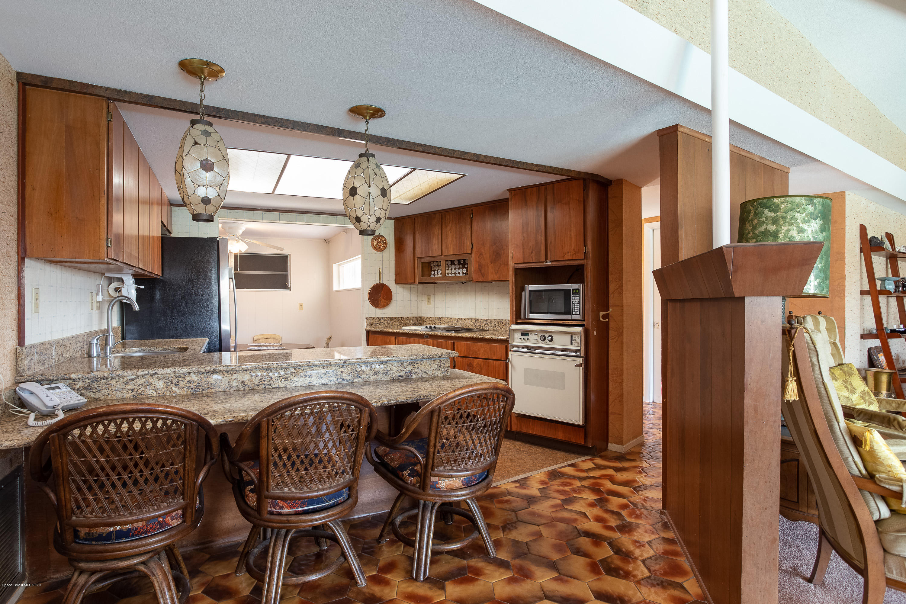 146 Bimini Road Cocoa Beach, FL 32931 - Photo 9 of 24 Kitchen w/adjacent eating space