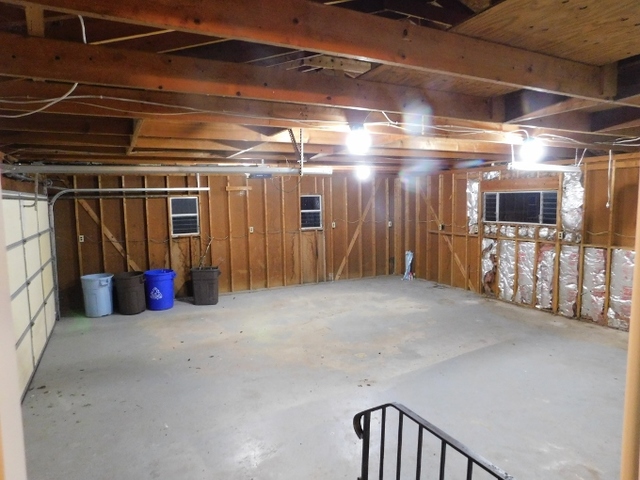 306 Errett Road Rochelle, IL 61068 - Photo 12 of 15 a view of a room with wooden walls