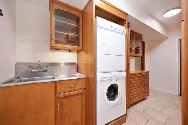 an aerial view of a house with a swimming pool