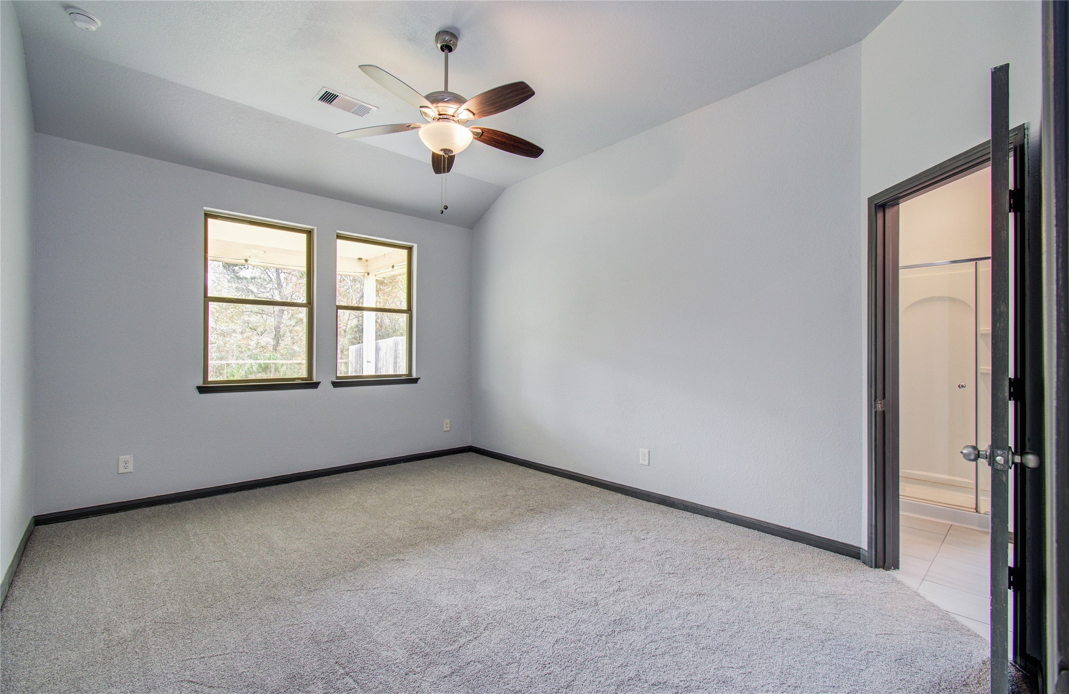 12147 La Salle River Road Conroe, TX 77304 - Photo 19 of 37 The primary bedroom is spacious and nice!