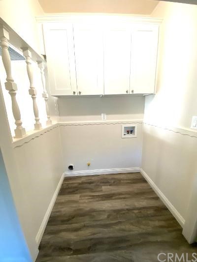 359 West Street, Unit A Upland, CA 91786 - Photo 13 of 24 a view of a small space with wooden floor and a window