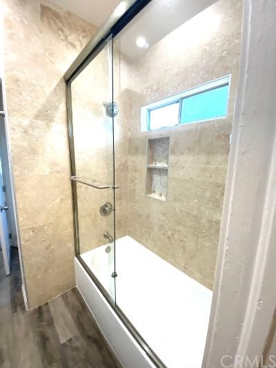 359 West Street, Unit A Upland, CA 91786 - Photo 10 of 24 a bathroom with a bathtub and a shower