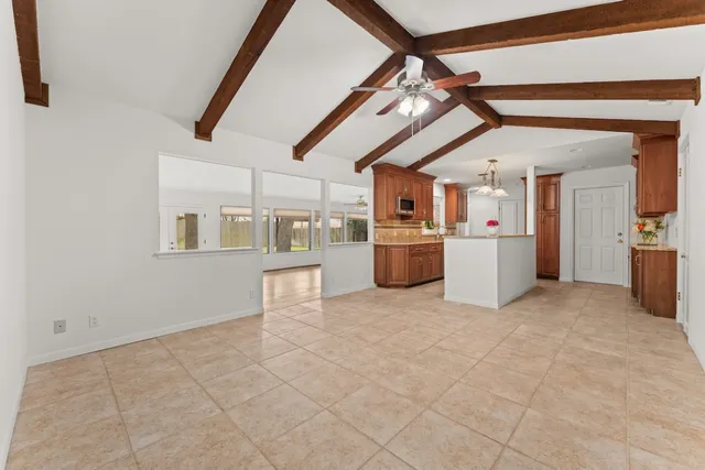 a view of a storage & utility room and utility room