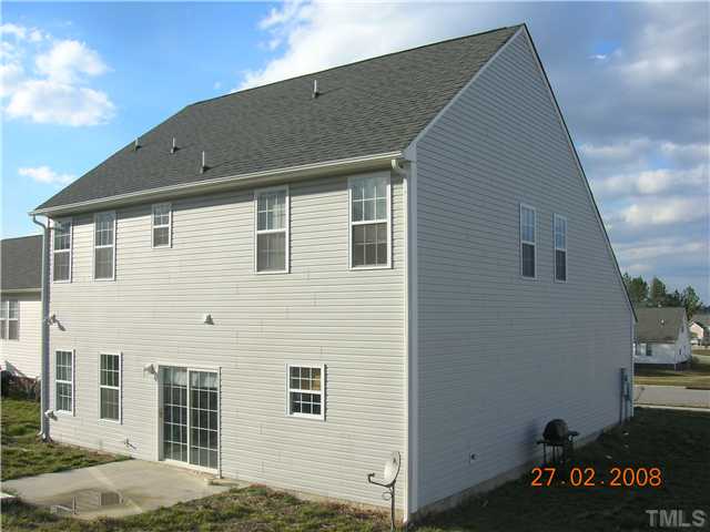 7116 Missionary Ridge Drive Raleigh, NC 27610 - Photo 2 of 12 a front view of a house with a garage