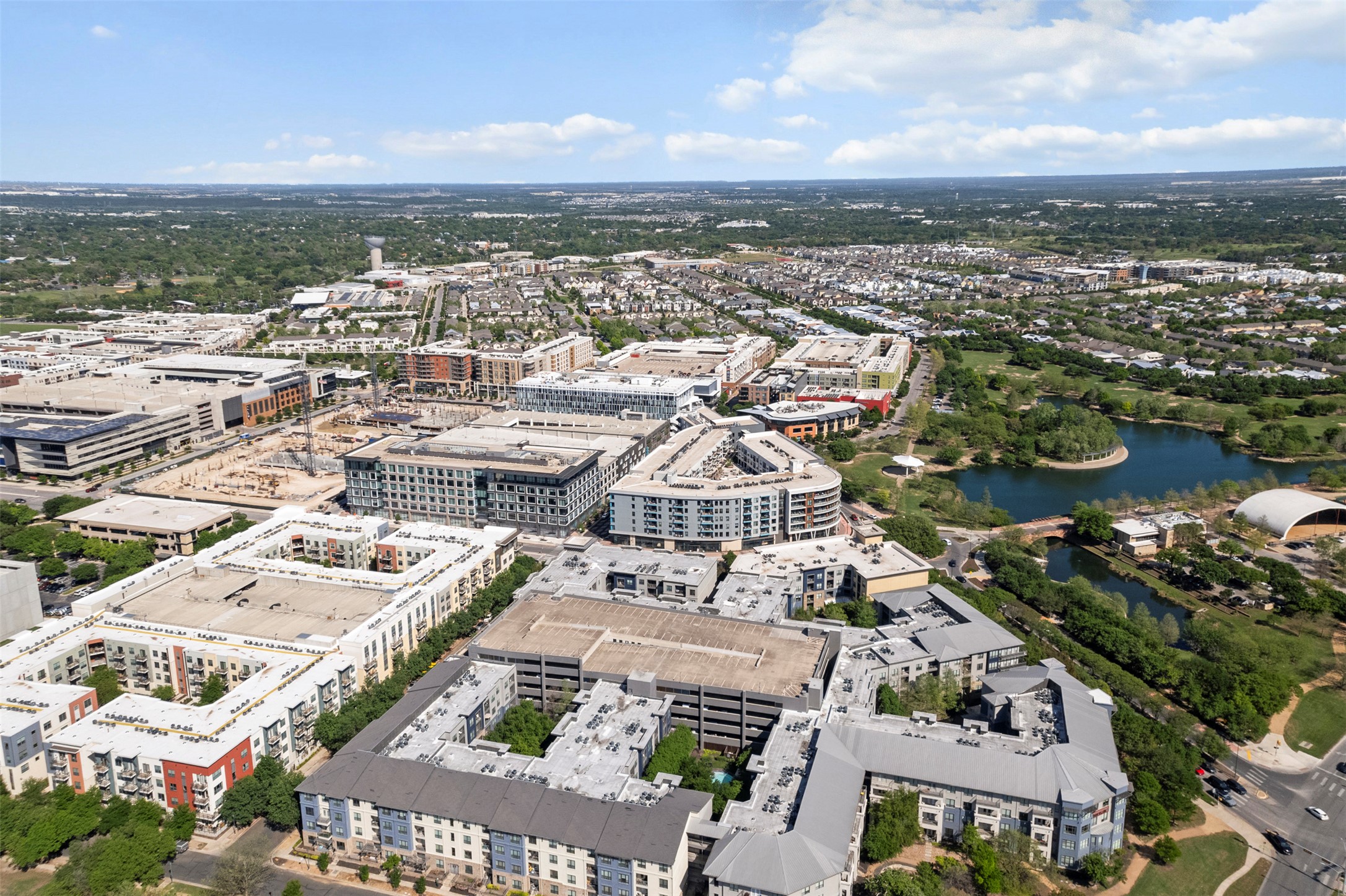 1701 Simond Avenue, Unit 418 Austin, TX 78723 - Photo 33 of 37 Bird's eye view featuring a view of city and a water view.