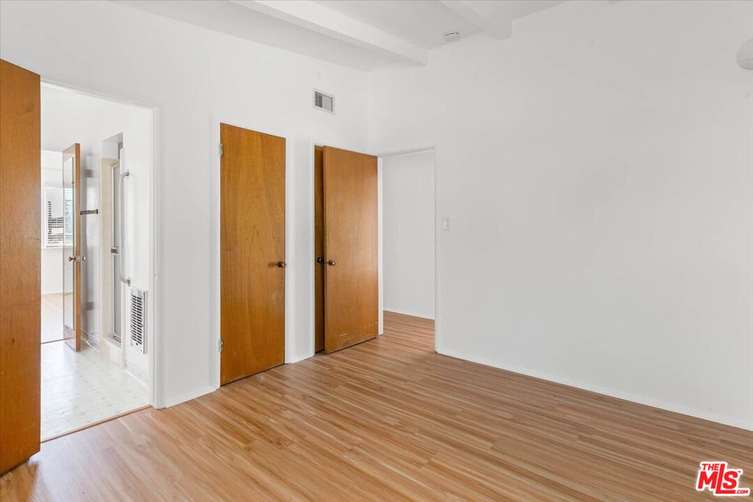 1012 Camann Street Glendale, CA 91208 - Photo 17 of 33 a view of a room with wooden floor and brick wall