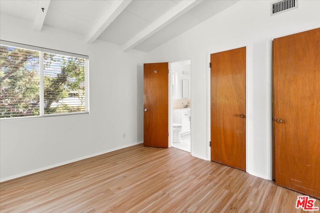 1012 Camann Street Glendale, CA 91208 - Photo 18 of 33 a view of an empty room with wooden floor and a window