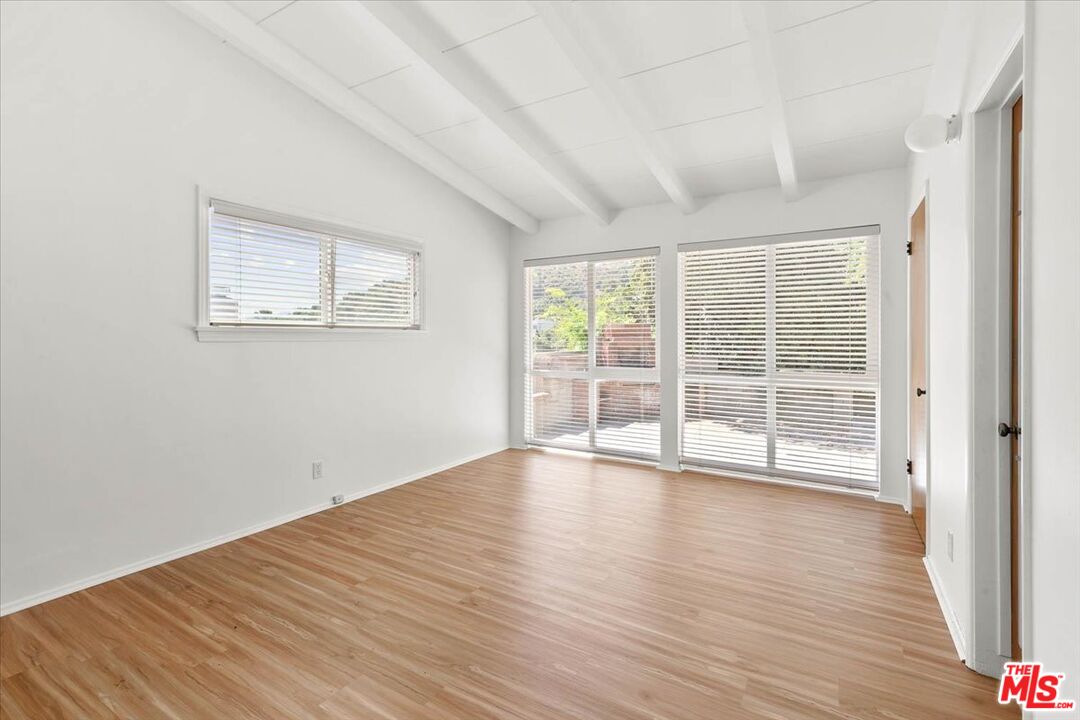 1012 Camann Street Glendale, CA 91208 - Photo 24 of 33 a view of an empty room with wooden floor and a window