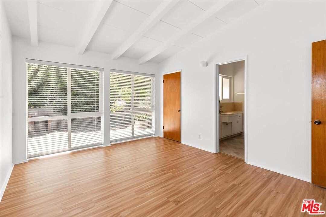 1012 Camann Street Glendale, CA 91208 - Photo 25 of 33 a view of an empty room with wooden floor and a window