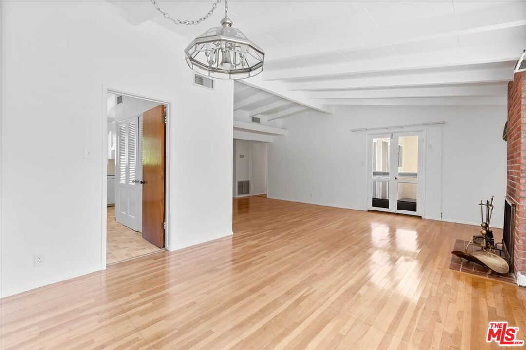 1012 Camann Street Glendale, CA 91208 - Photo 4 of 33 a view of empty room with wooden floor and window