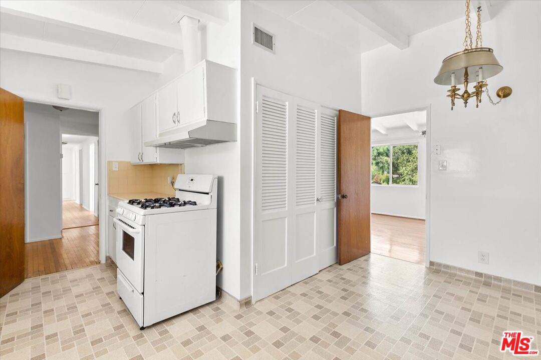 1012 Camann Street Glendale, CA 91208 - Photo 9 of 33 a kitchen with stainless steel appliances granite countertop a refrigerator a stove and a sink