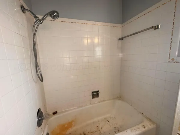 a bathroom with a bathtub