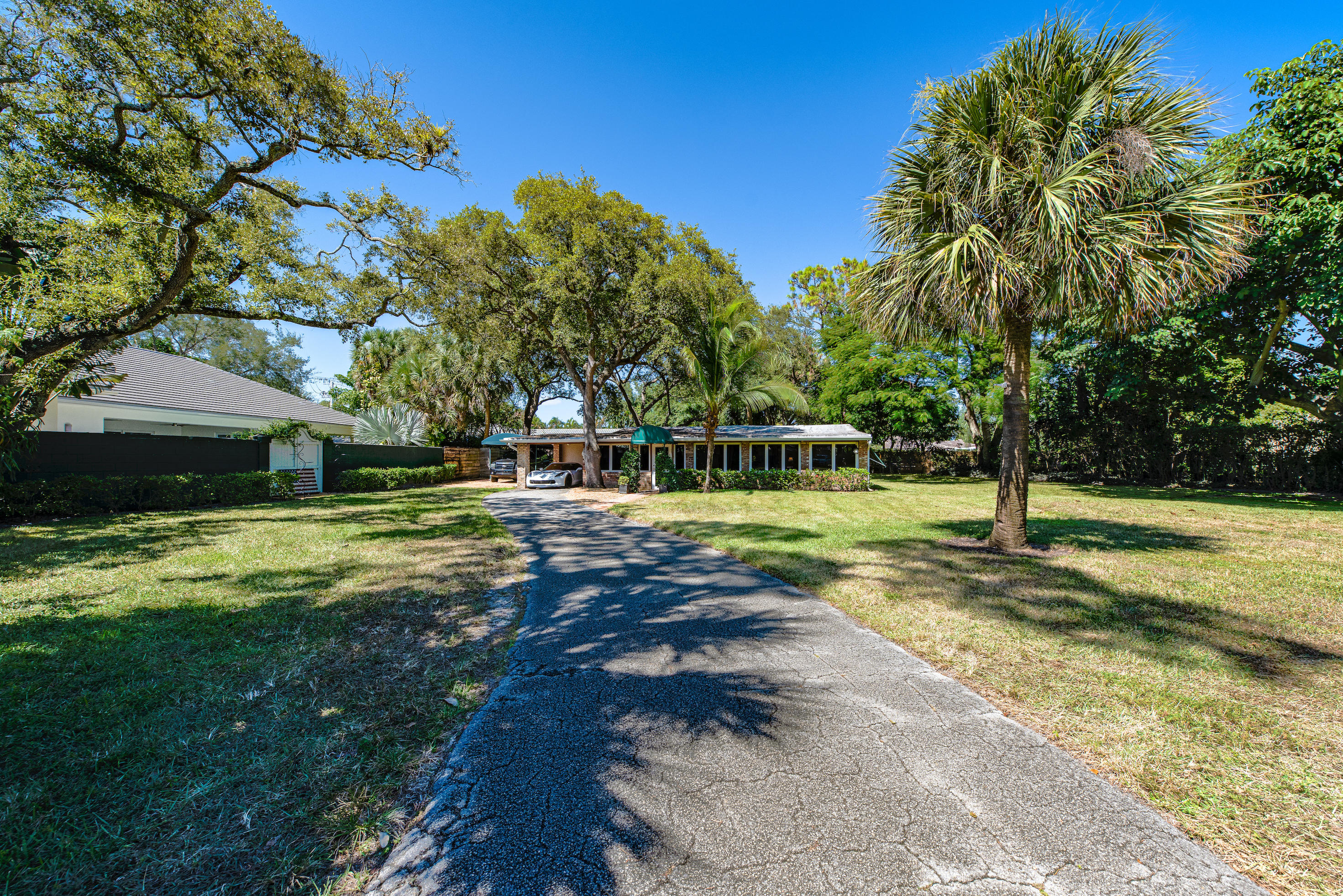 499 Northwest 9th Avenue Boca Raton, FL 33486 - Photo 15 of 20 Driveway-Facing-House-4