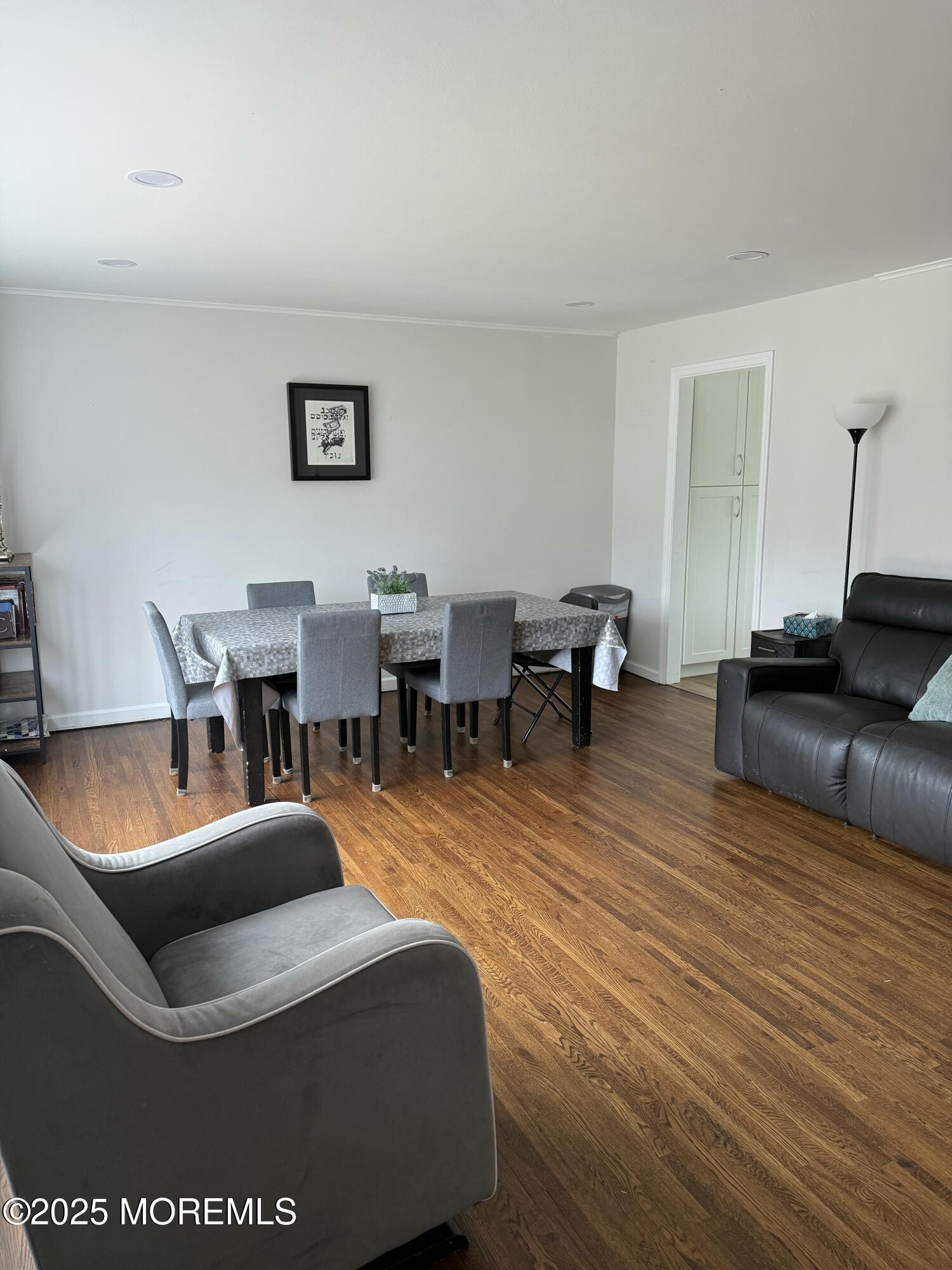 23 Hilltop Road West Long Branch, NJ 07764 - Photo 3 of 10 a living room with furniture and wooden floor
