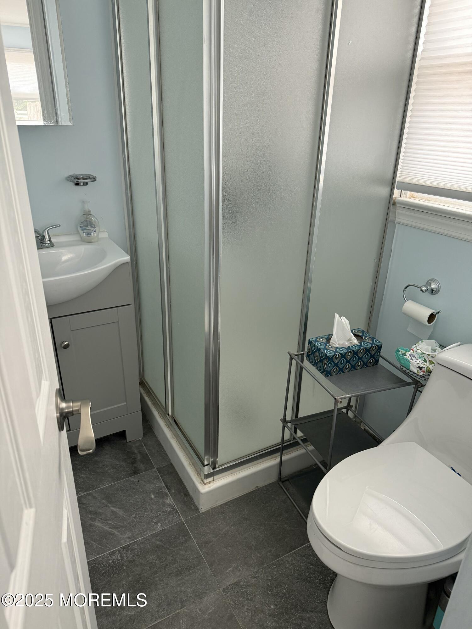 23 Hilltop Road West Long Branch, NJ 07764 - Photo 4 of 10 a bathroom with a toilet and a sink