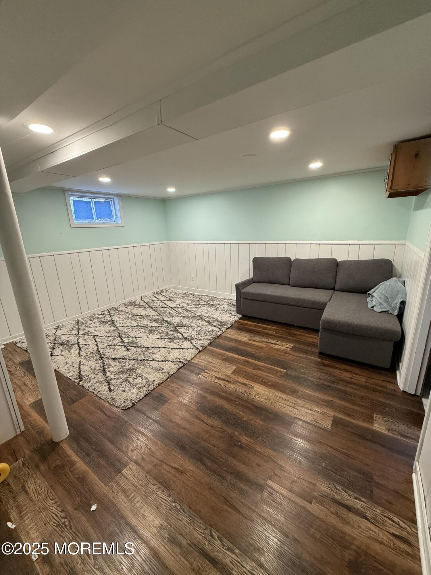 23 Hilltop Road West Long Branch, NJ 07764 - Photo 6 of 10 a living room with furniture and a couch