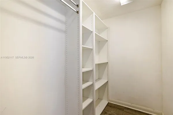 a view of an empty walk in closet