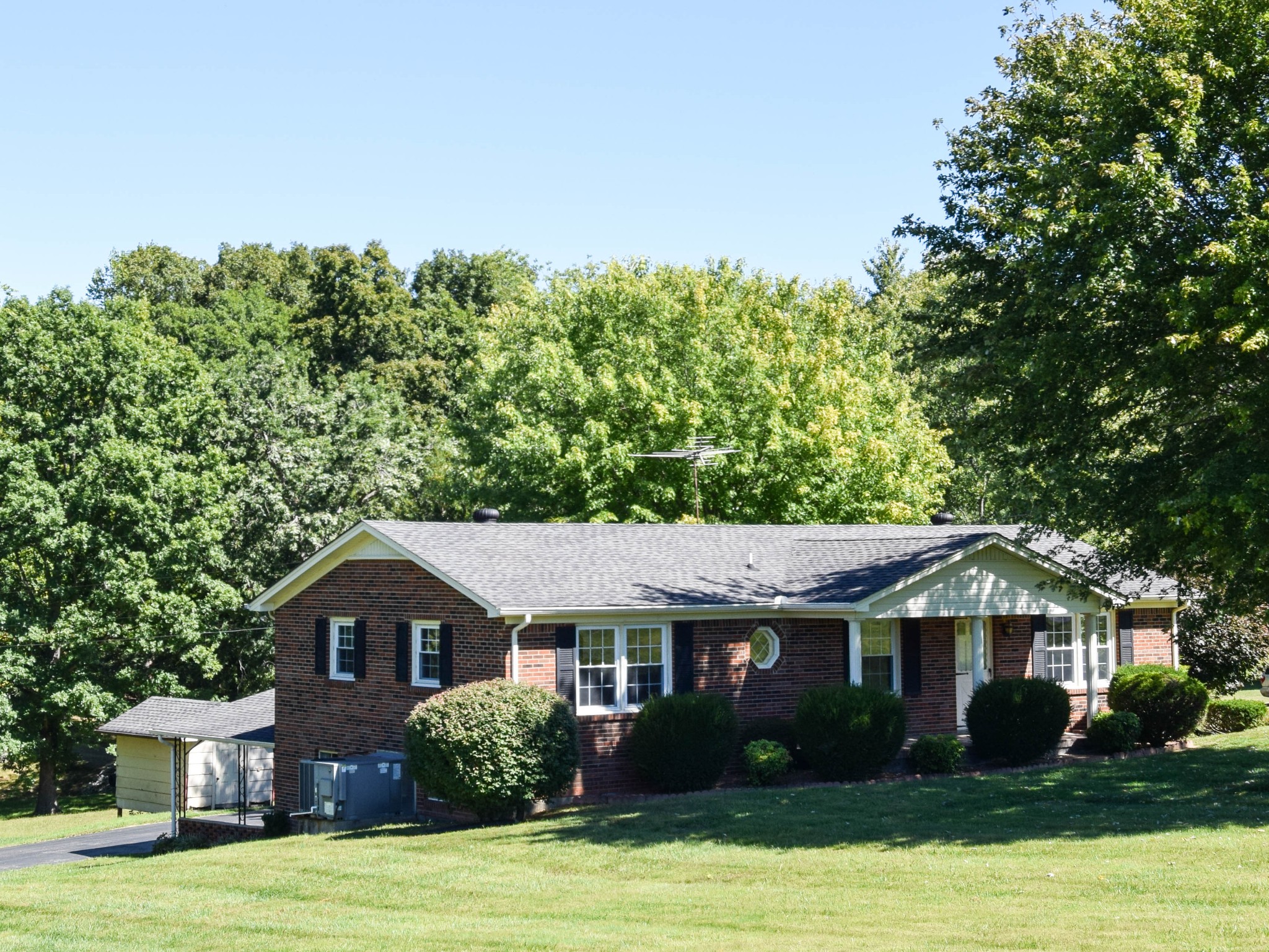 190 Link Road Cottontown, TN 37048 - Photo 1 of 1 a front view of a house with garden