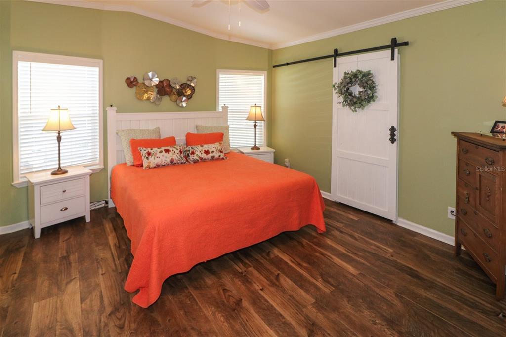 29200 South Jones Loop Road, Unit 715 Punta Gorda, FL 33950 - Photo 15 of 37 a bedroom with a bed and a window