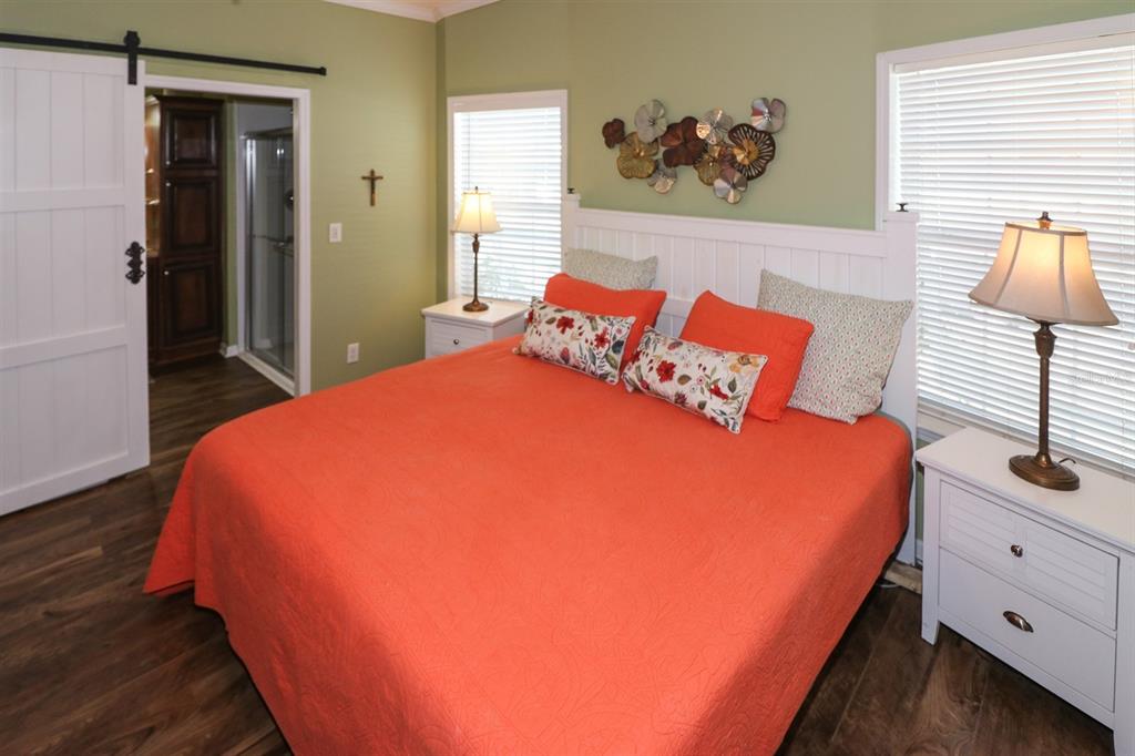 29200 South Jones Loop Road, Unit 715 Punta Gorda, FL 33950 - Photo 20 of 37 a bed sitting in a bedroom next to a window