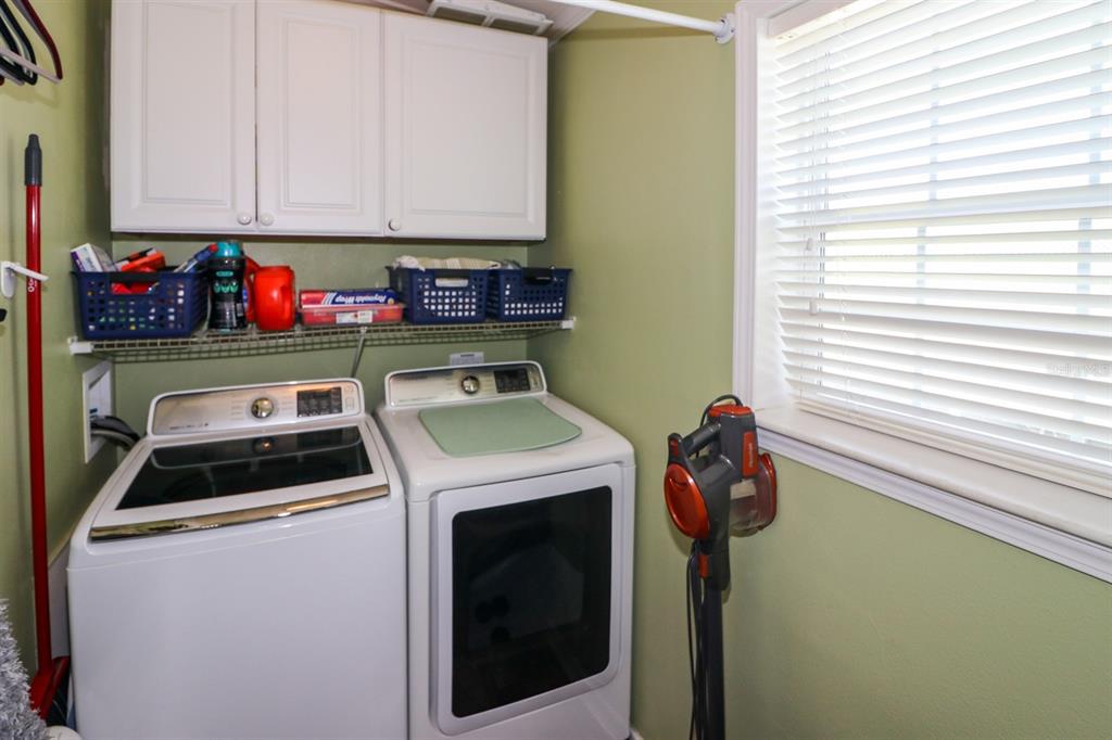 29200 South Jones Loop Road, Unit 715 Punta Gorda, FL 33950 - Photo 26 of 37 a utility room with dryer and washer