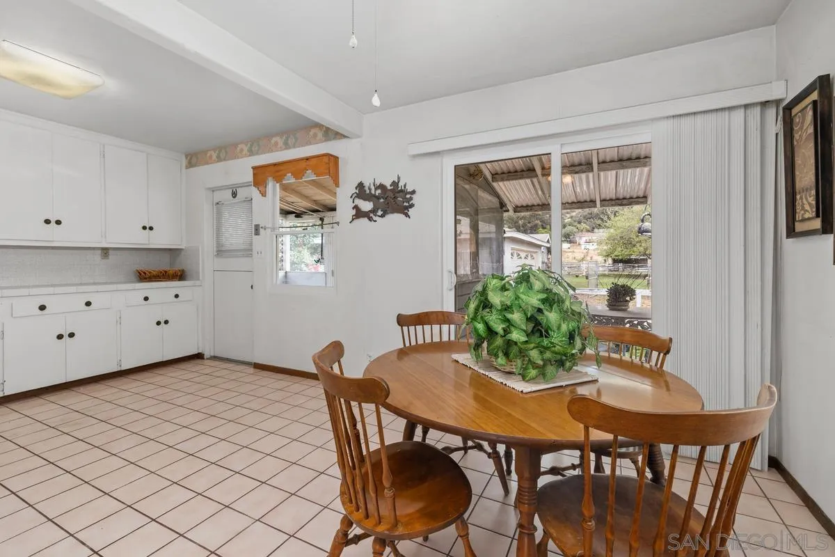 11179 Topo Lane Lakeside, CA 92040 - Photo 14 of 44 a view of a dining room with furniture and window