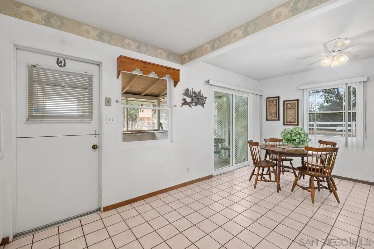 11179 Topo Lane Lakeside, CA 92040 - Photo 17 of 44 a dining room with furniture and window