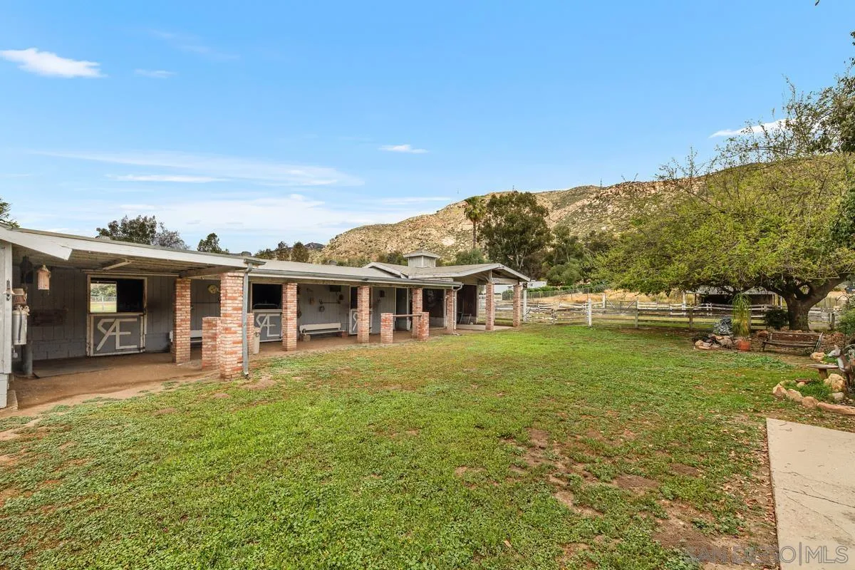11179 Topo Lane Lakeside, CA 92040 - Photo 24 of 44 a front view of a house with a garden