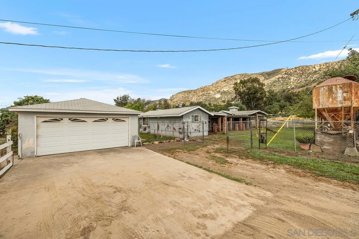 11179 Topo Lane Lakeside, CA 92040 - Photo 29 of 44 a view of a house with a yard