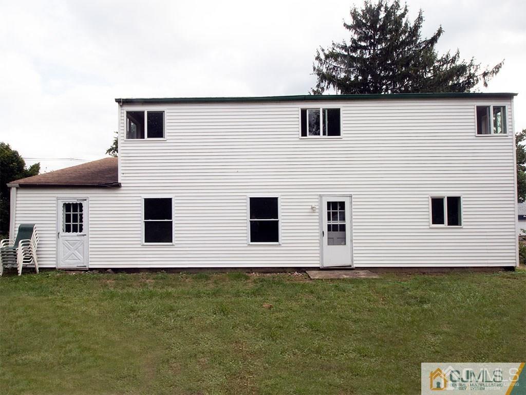 27 Eardley Road Edison, NJ 08817 - Photo 14 of 14 a house with garden in front of it